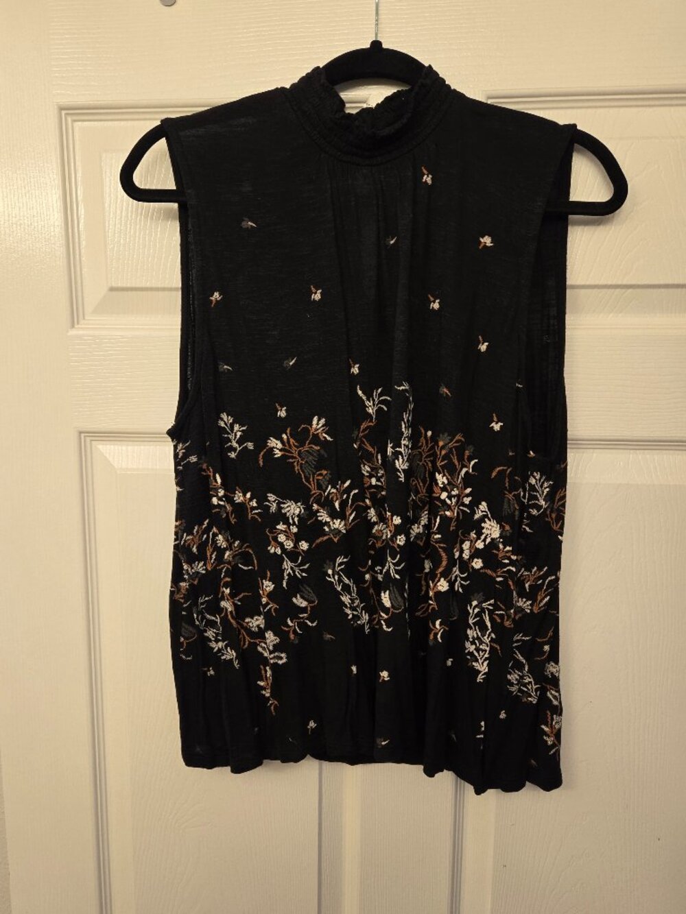 Lucky Brand - Black sleeveless blouse with faux embroidery, size XL.